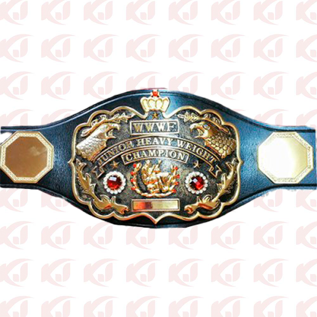 Tatsumi Fujinami of New Japan Pro Wrestling holds the title of WWWF Junior Heavyweight Champion Belt.